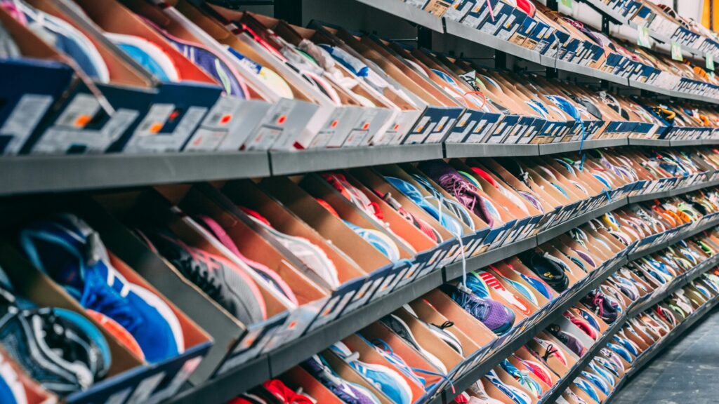 Shoes on shelves in a retail shop